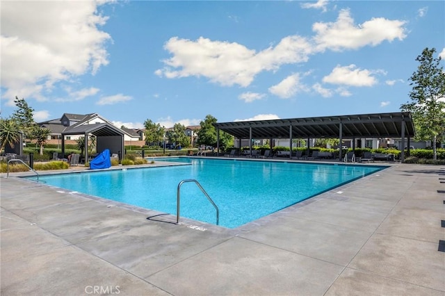 community pool featuring a patio area