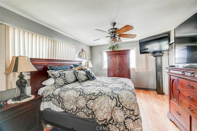 bedroom featuring ceiling fan and light wood finished floors