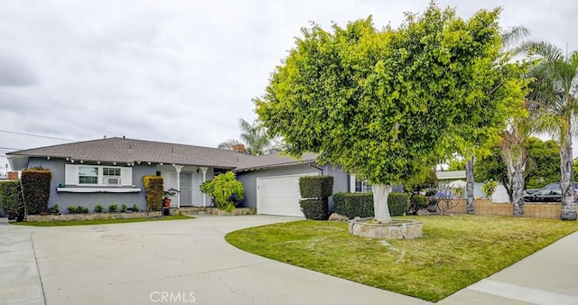 single story home with a garage, stucco siding, concrete driveway, and a front lawn