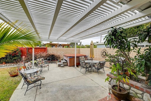 view of patio / terrace featuring outdoor dining area, a fenced backyard, a hot tub, and a pergola