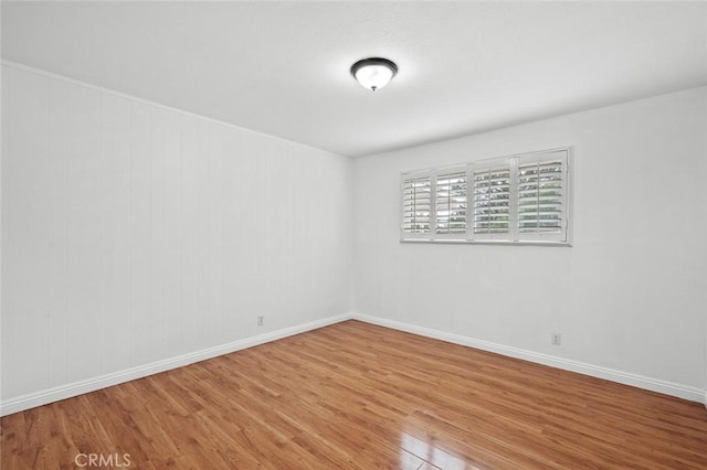 572 E Ghent St, San Dimas, CA 91773 - unfurnished room featuring baseboards and wood finished floors