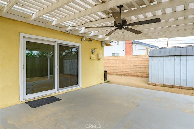 572 E Ghent St, San Dimas, CA 91773 - view of patio / terrace with a ceiling fan, a storage shed, an outbuilding, fence, and a pergola