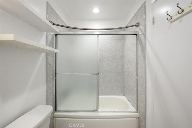 572 E Ghent St, San Dimas, CA 91773 - bathroom featuring shower / bath combination with glass door, toilet, and recessed lighting
