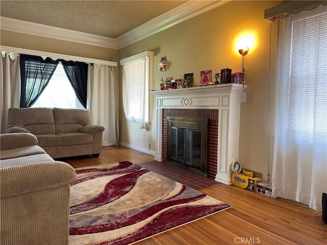 4524 2nd Ave, Los Angeles, CA 90043 - living area with a textured ceiling, ornamental molding, wood finished floors, and a fireplace