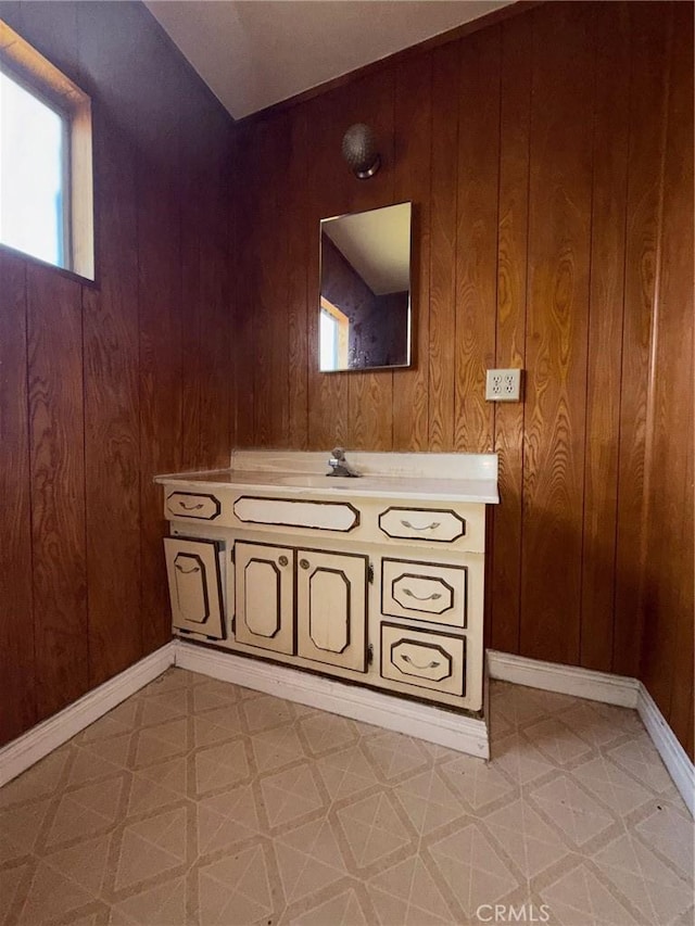 4524 2nd Ave, Los Angeles, CA 90043 - details featuring wooden walls, tile patterned floors, and baseboards