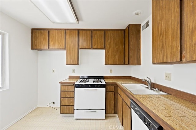 9502 Via Salerno, Burbank, CA 91504 - kitchen with white appliances, a sink, brown cabinets, and light countertops