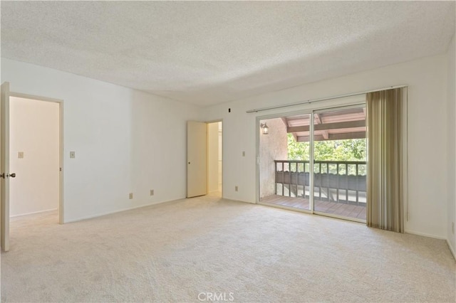 9502 Via Salerno, Burbank, CA 91504 - carpeted spare room with a textured ceiling and baseboards