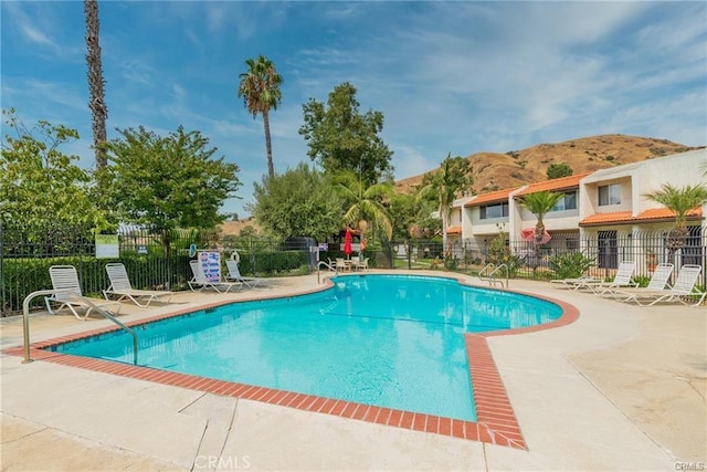 9502 Via Salerno, Burbank, CA 91504 - community pool featuring a patio and a mountain view