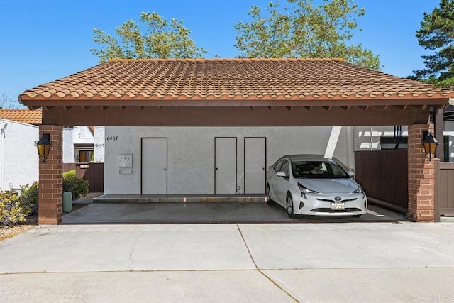 exterior space featuring a tiled roof and stucco siding