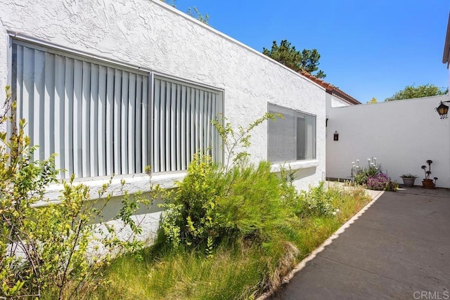 view of home's exterior featuring stucco siding