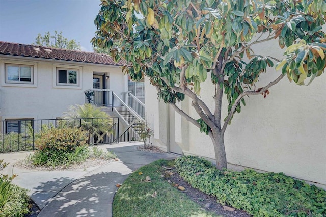 1982 Fairlee Dr, Encinitas, CA 92024 - property entrance with stucco siding and a tiled roof