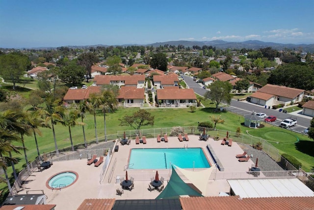 1982 Fairlee Dr, Encinitas, CA 92024 - aerial perspective of suburban area with a pool and a mountain backdrop