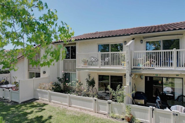 1982 Fairlee Dr, Encinitas, CA 92024 - back of property featuring a tile roof, a balcony, and stucco siding