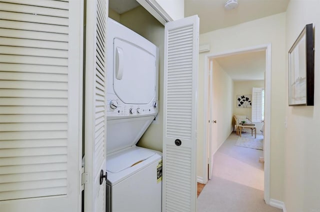 1982 Fairlee Dr, Encinitas, CA 92024 - washroom with stacked washer and clothes dryer and carpet