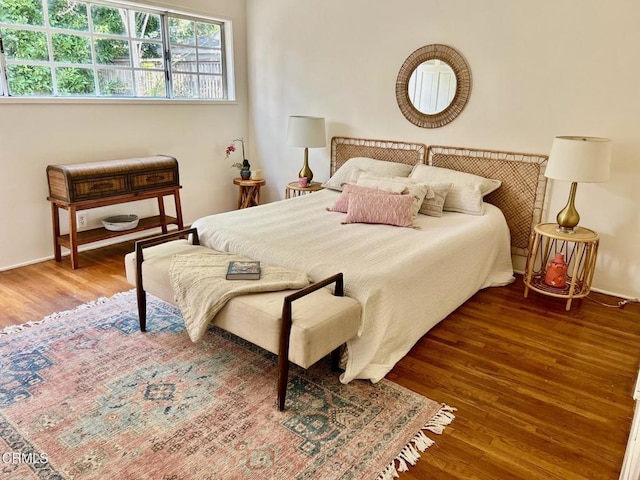 bedroom featuring wood finished floors