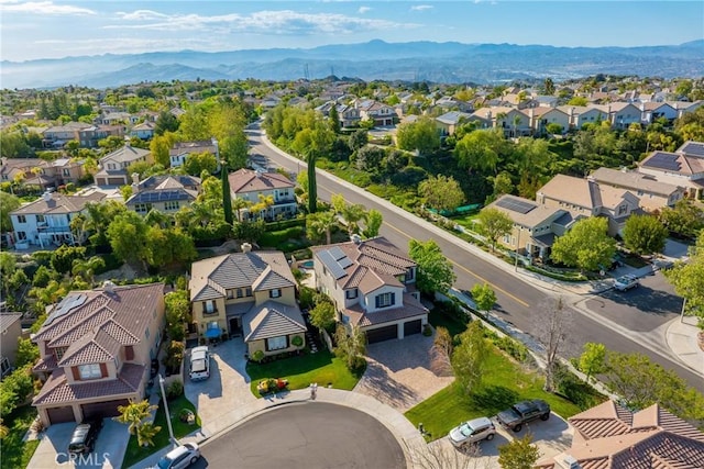 aerial view featuring a mountain view and a residential view