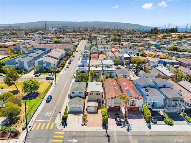aerial view featuring a mountain view and a residential view