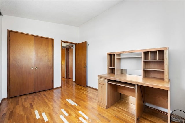 unfurnished office with light wood-style floors