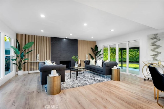 1061 Colby Cir, Thousand Oaks, CA 91362 - living room featuring light wood finished floors, recessed lighting, and a fireplace