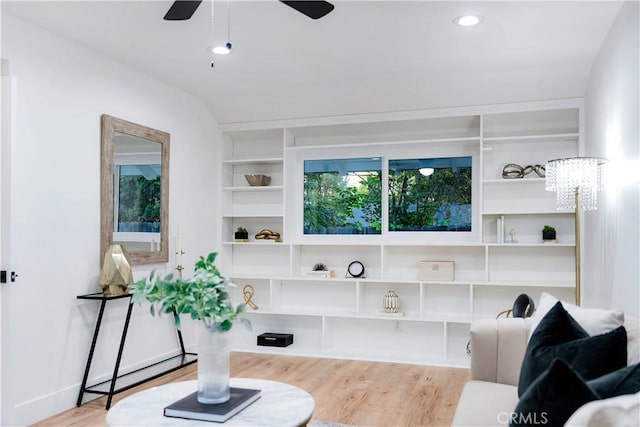 1061 Colby Cir, Thousand Oaks, CA 91362 - living area with a ceiling fan, wood finished floors, and built in shelves