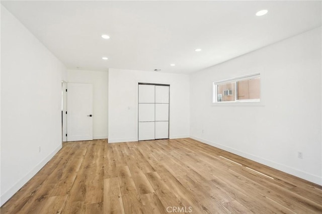 3427 S Victoria Ave, Los Angeles, CA 90016 - unfurnished bedroom featuring recessed lighting, baseboards, and light wood-type flooring