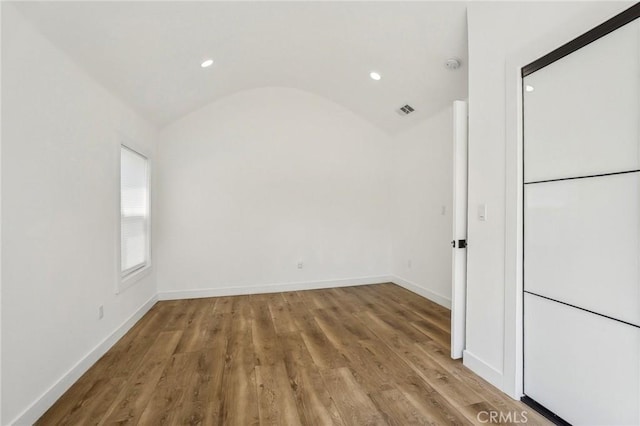 3427 S Victoria Ave, Los Angeles, CA 90016 - interior space featuring recessed lighting, baseboards, wood finished floors, lofted ceiling, and visible vents