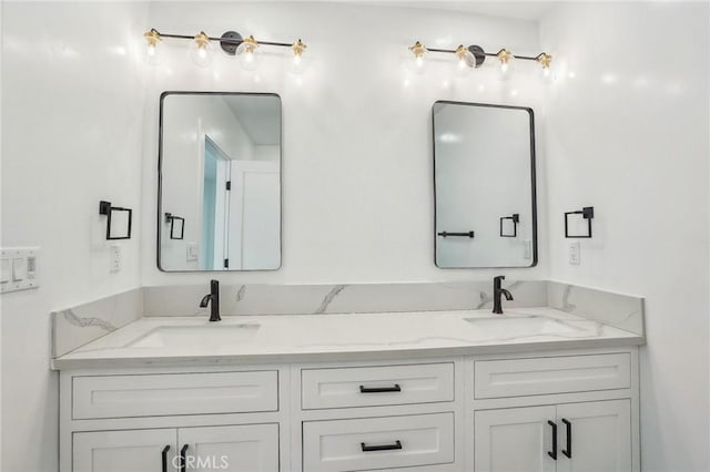 3427 S Victoria Ave, Los Angeles, CA 90016 - bathroom featuring double vanity and a sink