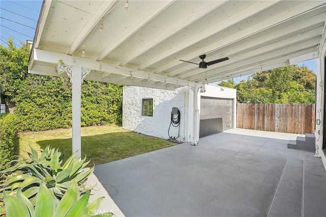 3427 S Victoria Ave, Los Angeles, CA 90016 - view of patio / terrace featuring a garage, ceiling fan, fence, and an outbuilding