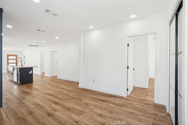 3427 S Victoria Ave, Los Angeles, CA 90016 - interior space with recessed lighting, baseboards, visible vents, and light wood-style flooring