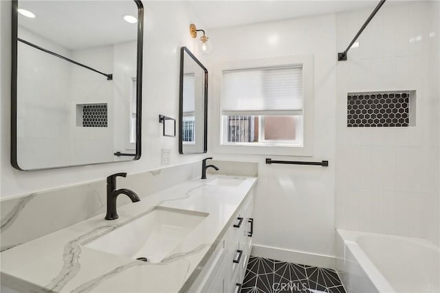 3427 S Victoria Ave, Los Angeles, CA 90016 - bathroom featuring a sink, baseboards, tile patterned flooring, and double vanity