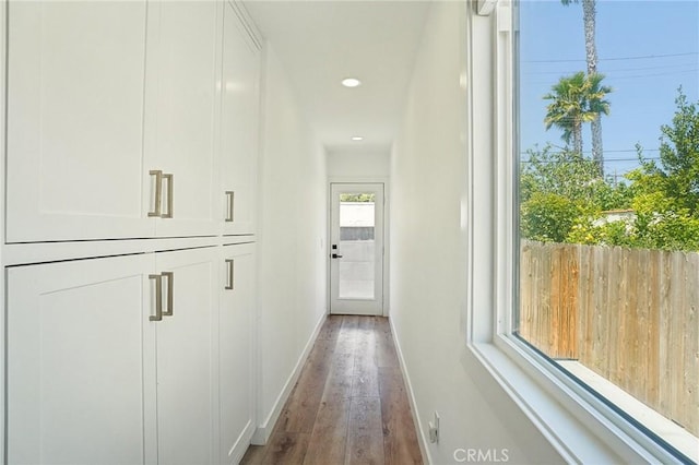 3427 S Victoria Ave, Los Angeles, CA 90016 - hall with baseboards, recessed lighting, and wood finished floors
