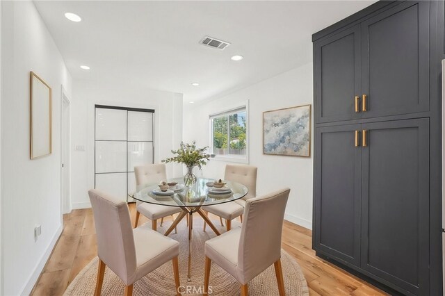 3427 S Victoria Ave, Los Angeles, CA 90016 - dining room featuring recessed lighting, baseboards, visible vents, and light wood-type flooring