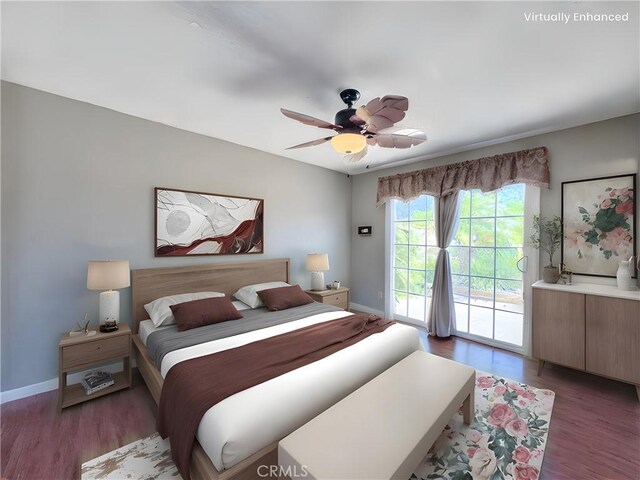 bedroom with baseboards, wood finished floors, and access to exterior
