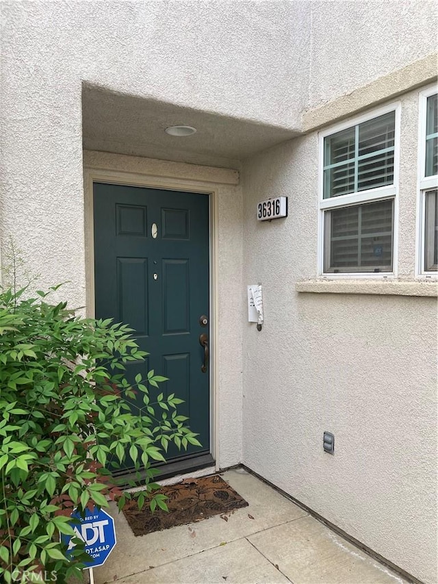 36316 Grazia Way, Winchester, CA 92596 - property entrance featuring stucco siding