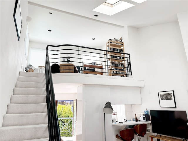 stairway with a skylight