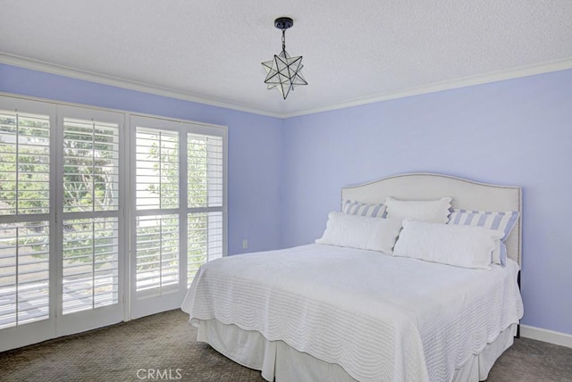 bedroom with carpet flooring, a textured ceiling, and crown molding