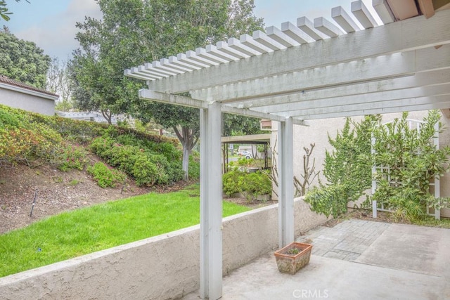 view of patio featuring a pergola