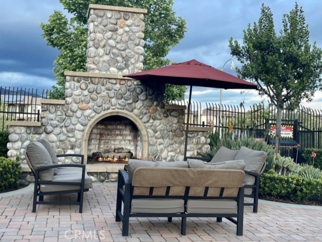 900 N Primrose Ln Unit A, Azusa, CA 91702 - view of patio featuring an outdoor living space with a fireplace