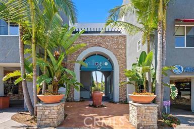 entrance to property featuring stucco siding