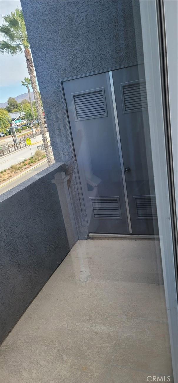 doorway to property with a balcony