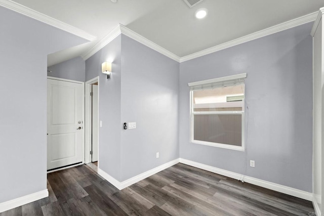 unfurnished room with baseboards, ornamental molding, and wood finished floors