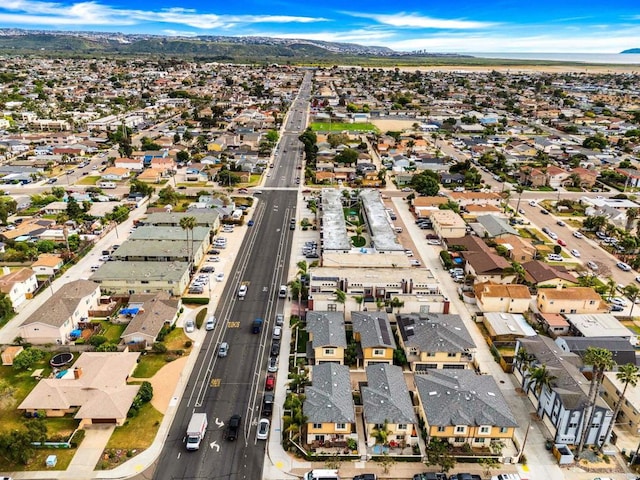 drone / aerial view with a mountain view and a residential view