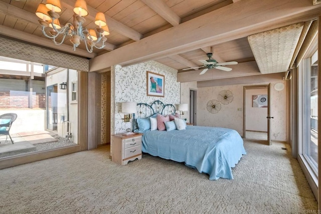 carpeted bedroom featuring beamed ceiling, wallpapered walls, wooden ceiling, and ceiling fan with notable chandelier