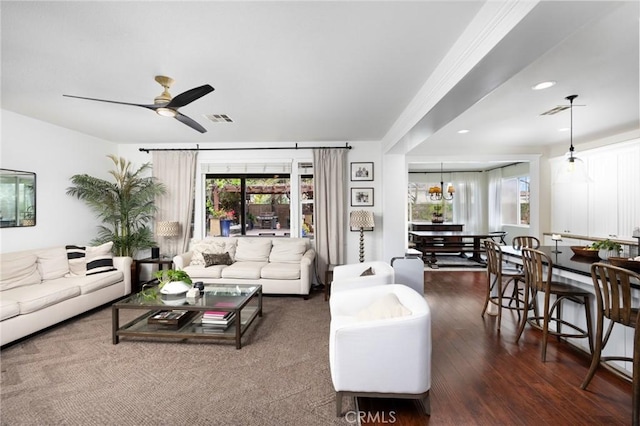 13216 Finish Draft Ct, Eastvale, CA 92880 - living area featuring ceiling fan, dark wood-style floors, a chandelier, and recessed lighting