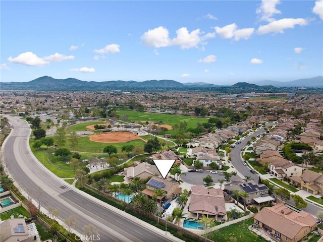 13216 Finish Draft Ct, Eastvale, CA 92880 - aerial perspective of suburban area featuring a mountainous background