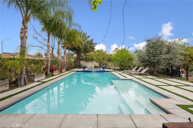 13216 Finish Draft Ct, Eastvale, CA 92880 - view of pool with a fenced backyard and a patio area