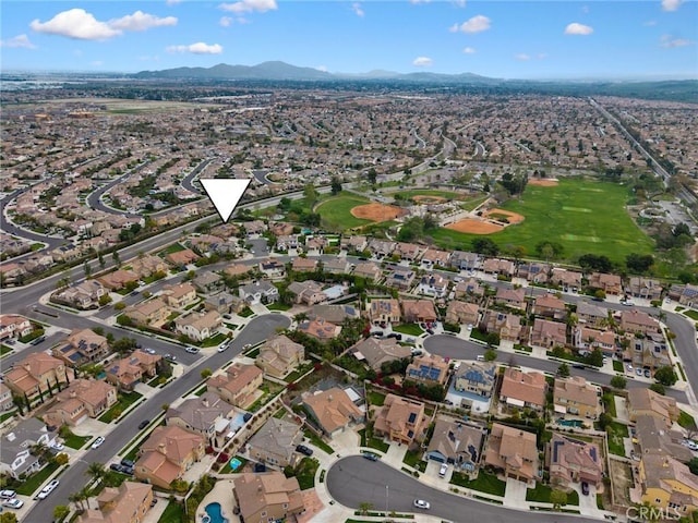 13216 Finish Draft Ct, Eastvale, CA 92880 - aerial view of property and surrounding area featuring mountains and nearby suburban area