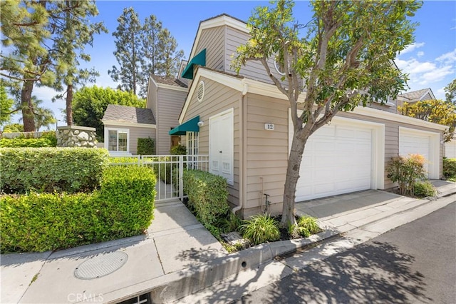 view of front facade featuring a garage and concrete driveway
