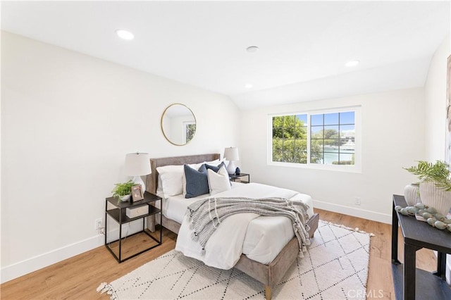 bedroom featuring recessed lighting, baseboards, and light wood finished floors