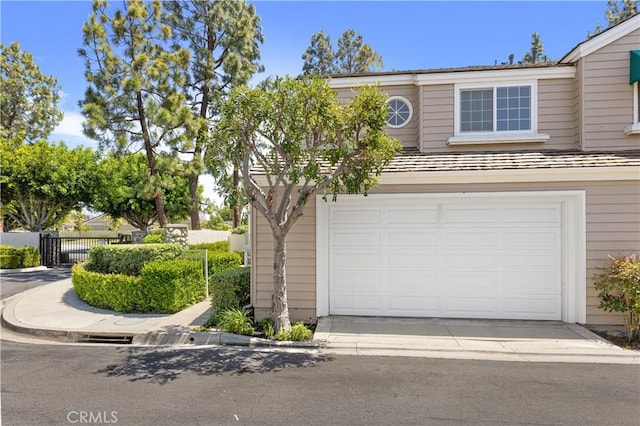 garage featuring fence